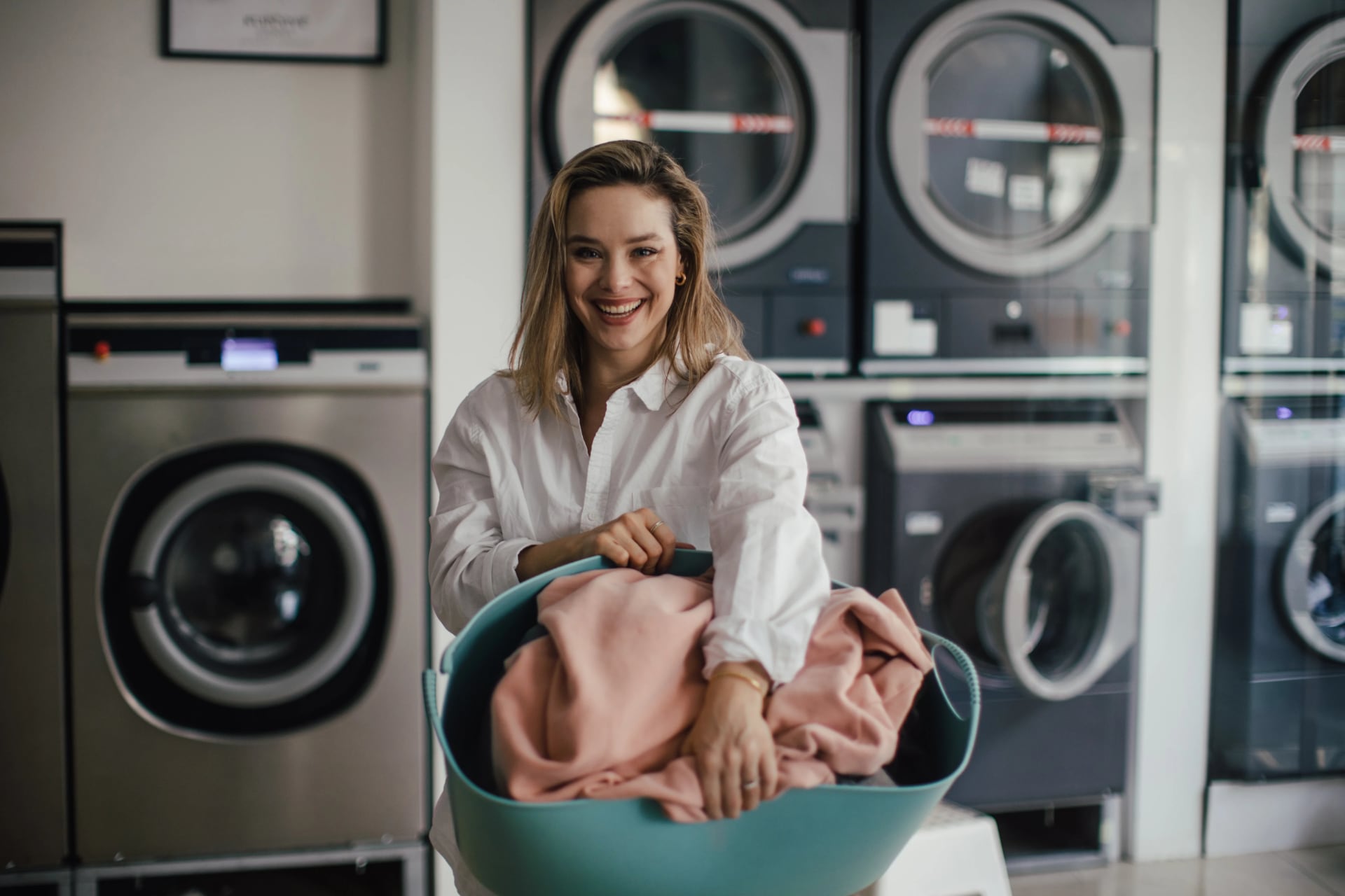 Laundry room scene, eco-friendly laundry tips to wash greener and cut waste