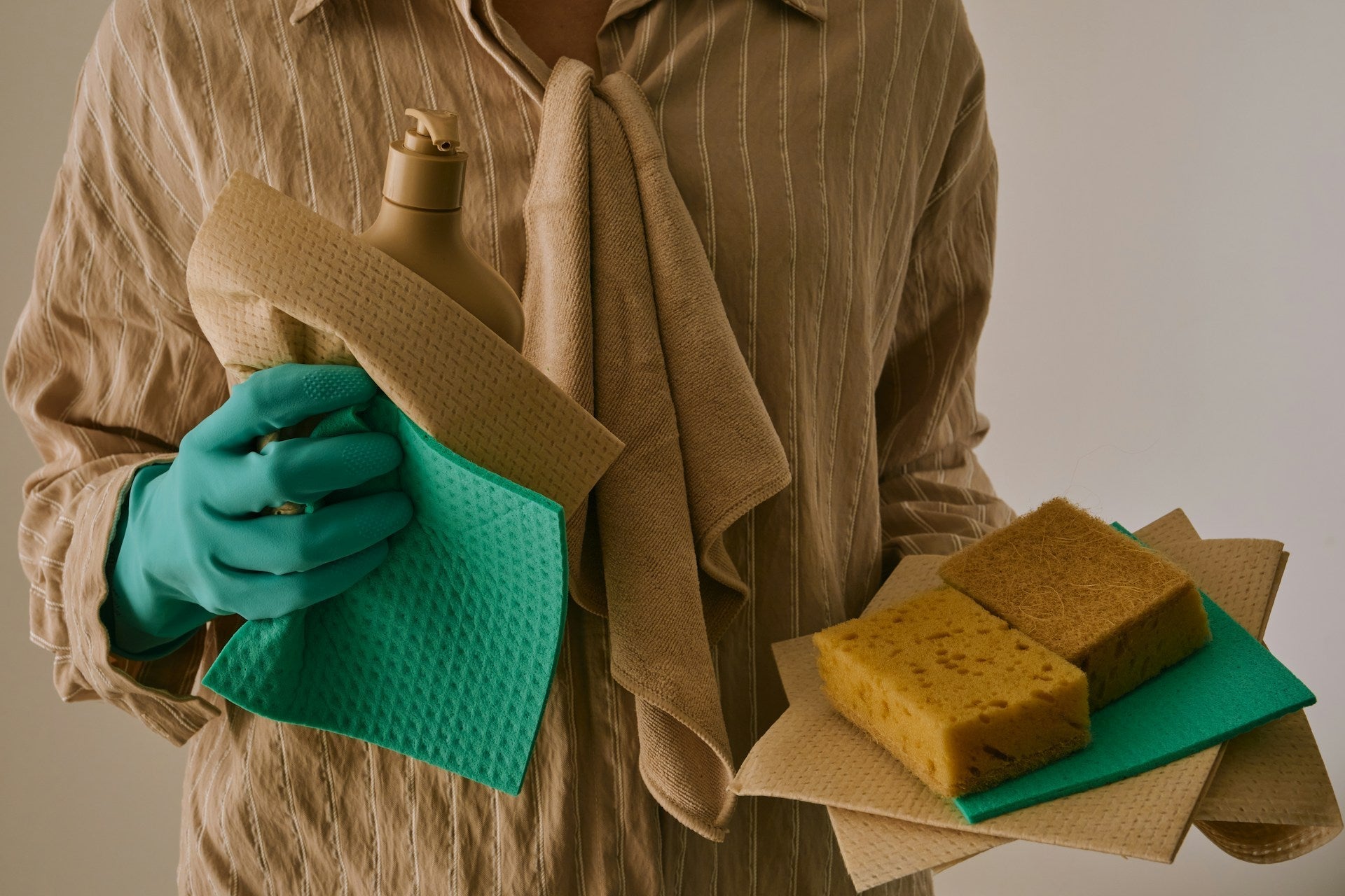Plastic-free cleaning supplies on a counter, the easiest way to start a plastic-free cleaning routine