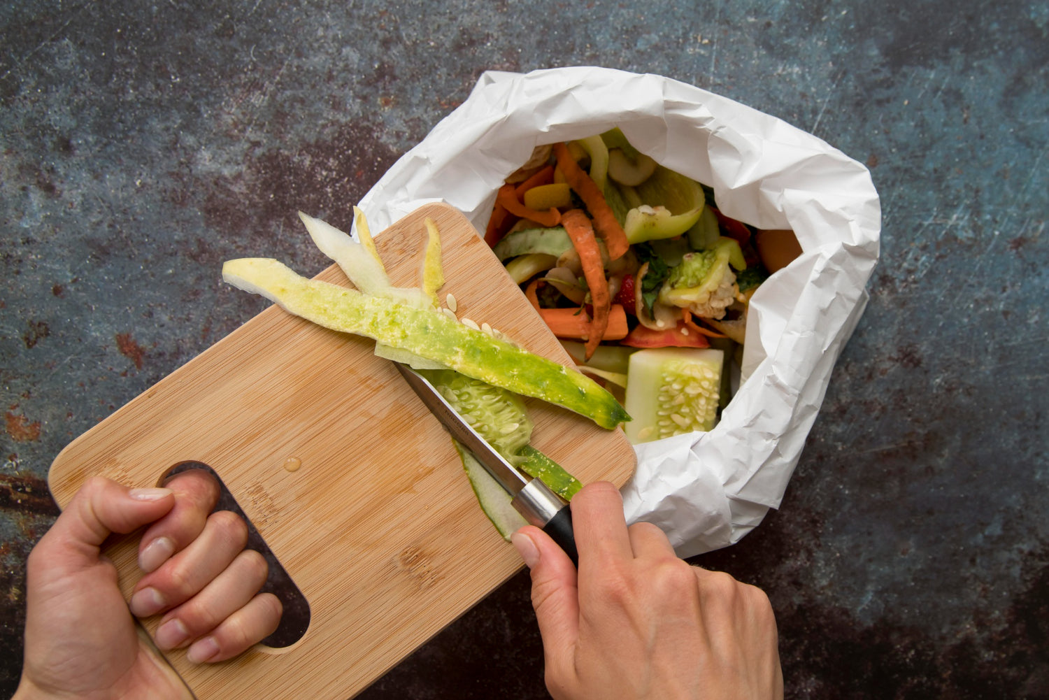 Compostable garbage bag in a bin, how to switch to biodegradable garbage bags for a greener home