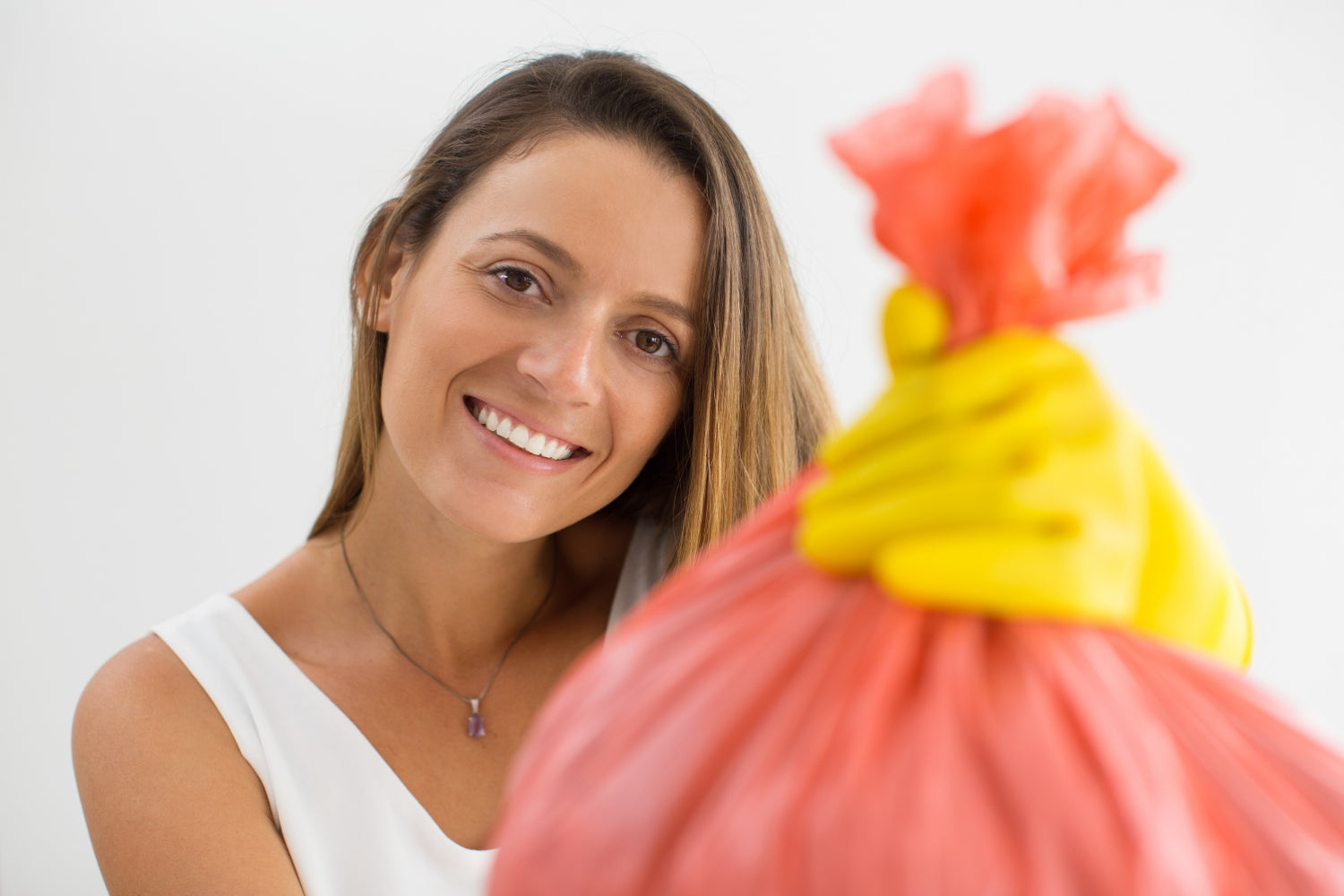 Compostable trash bag in a kitchen bin, quick and easy eco-friendly cleaning hacks