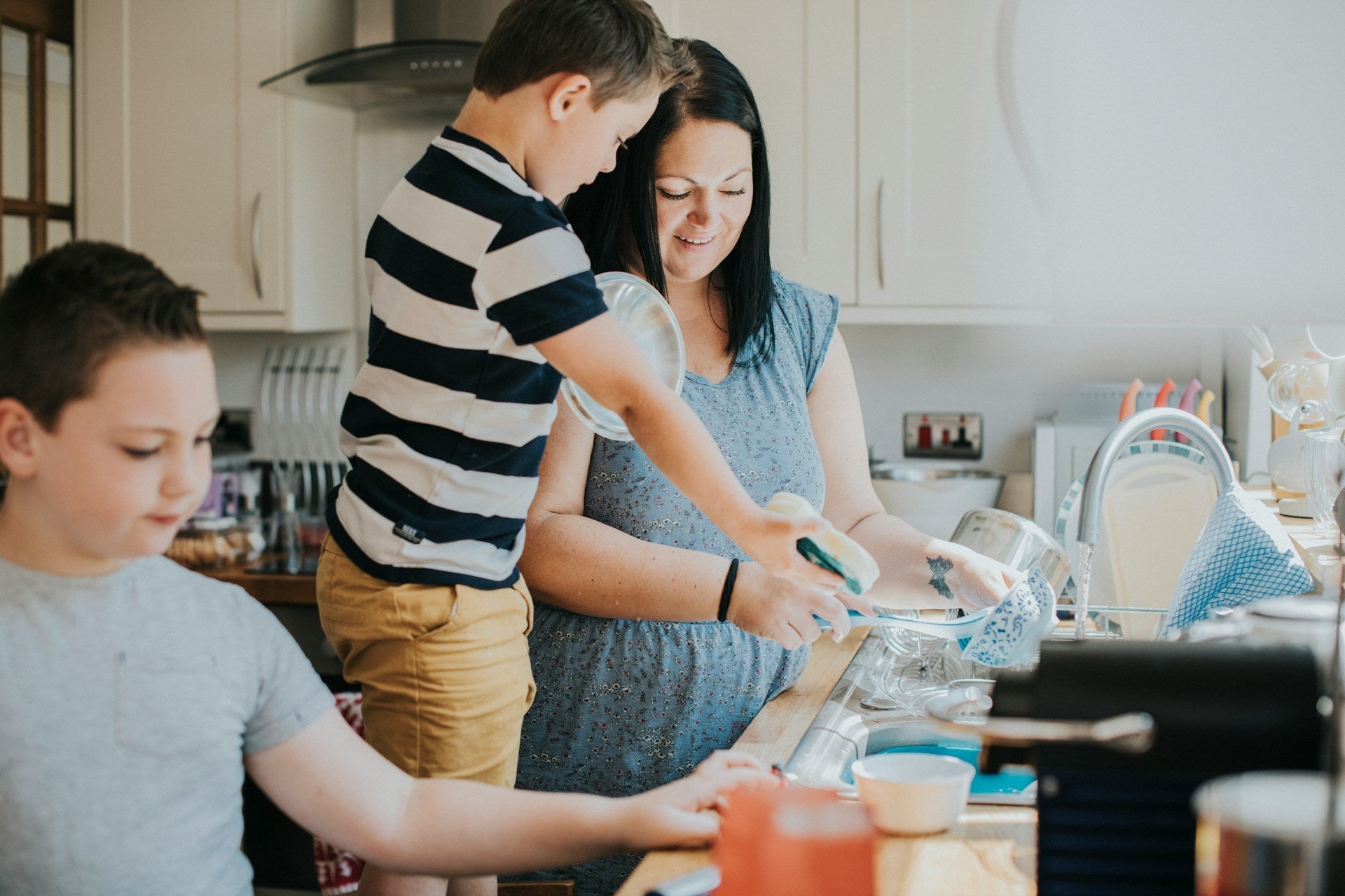 Child doing kid-friendly chores, teaching kids eco-friendly cleaning habits at home
