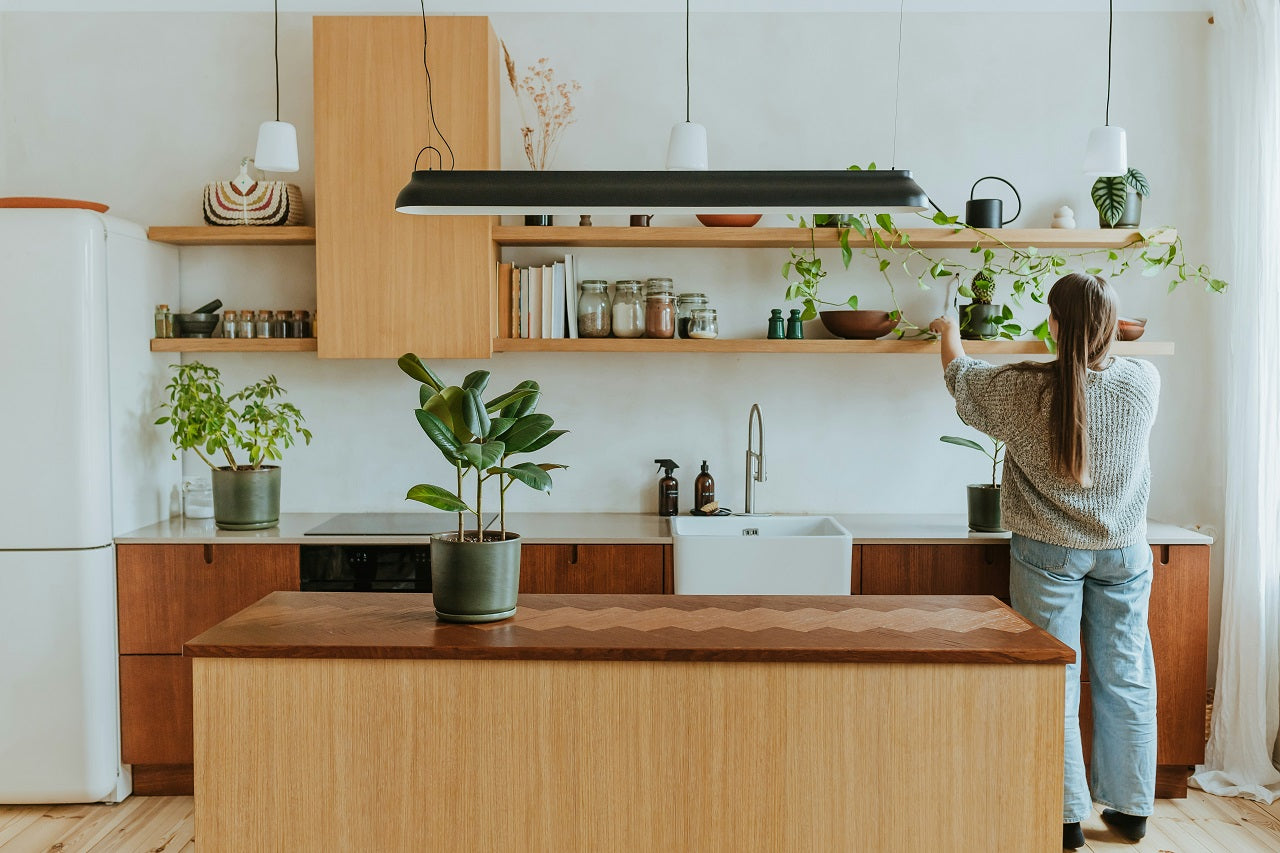 Kitchen being cleaned, green kitchen cleaning tips for a spotless, sustainable space