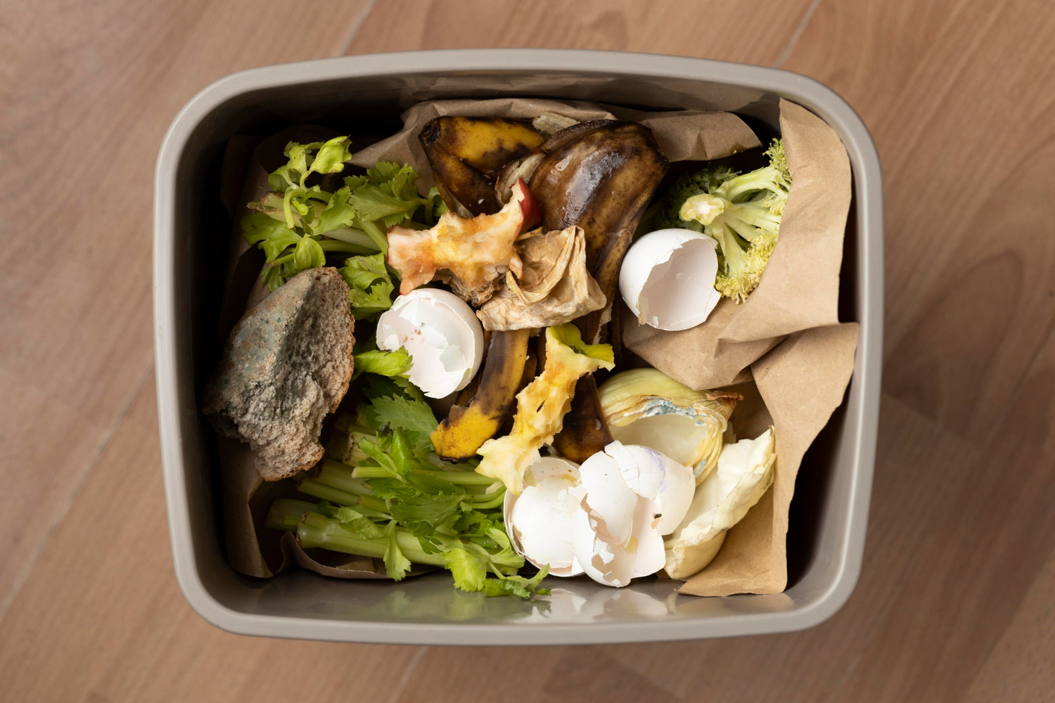Food scraps sorted into a bin for simple holiday food scrap sorting at home
