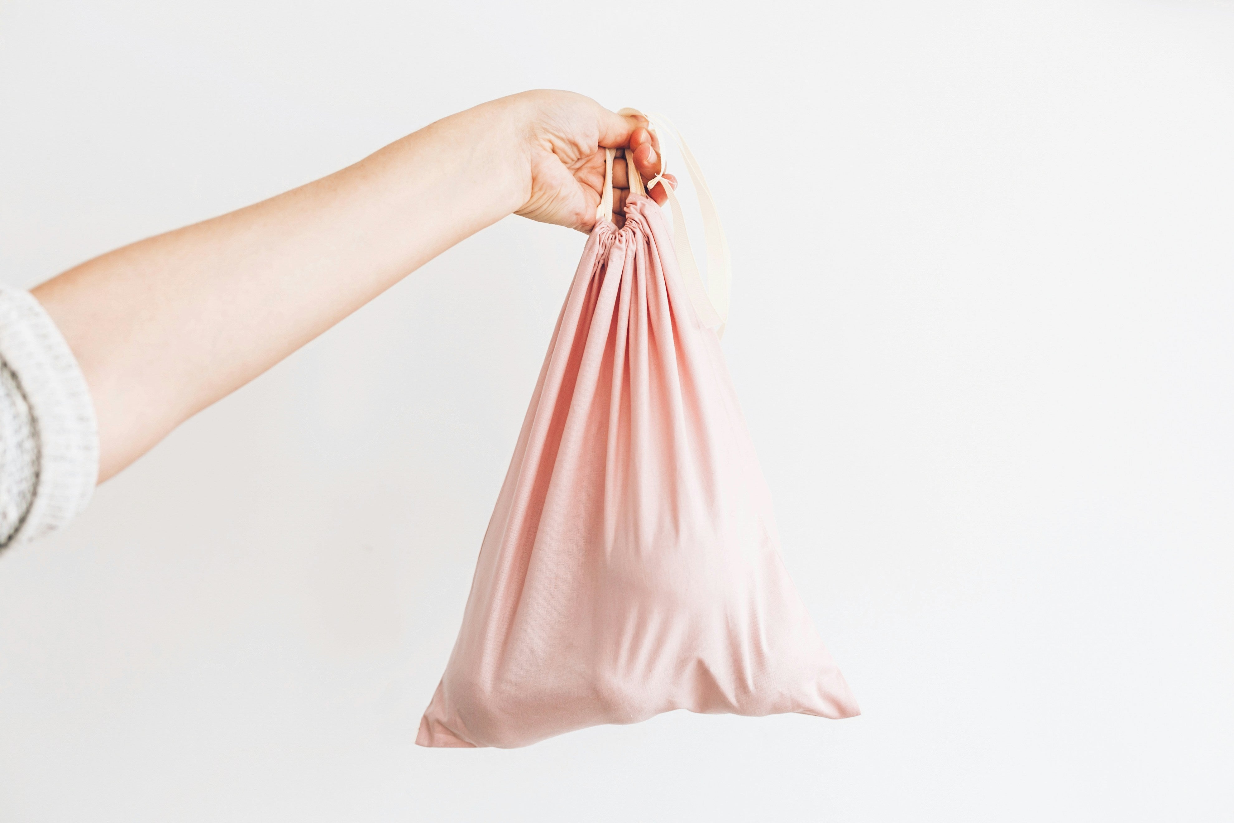 Compostable bag holding waste, why compostable trash bags are essential for eco-conscious homes