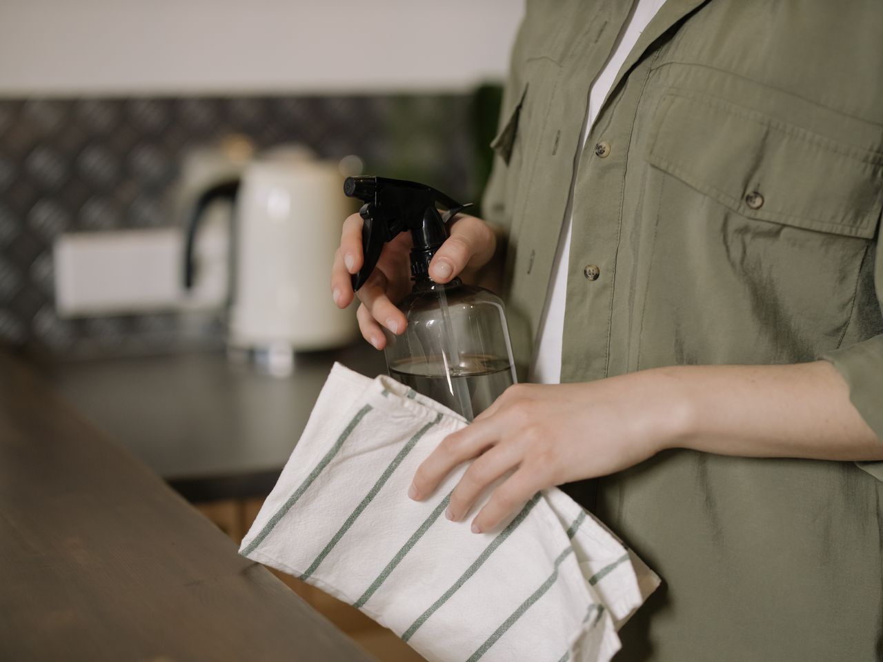 Mineral-based cleaning sprays on a counter for small kitchens that get messy quickly