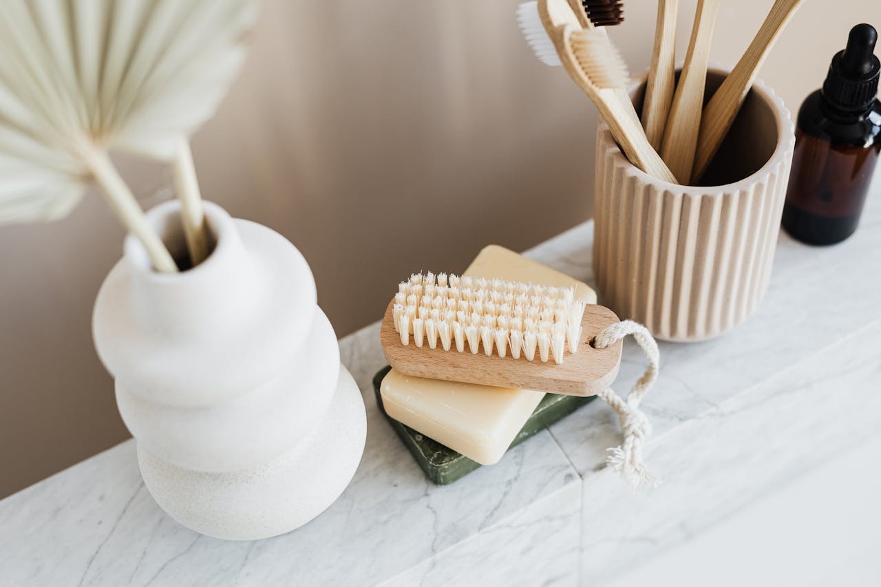 Plastic-free bathroom setup with natural cleaning recipes and low-waste swaps