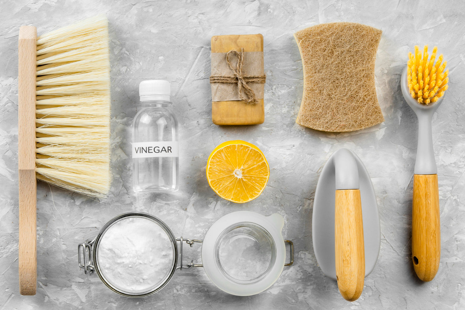 Reusable cleaning products laid out, making sustainable cleaning supplies last through summer
