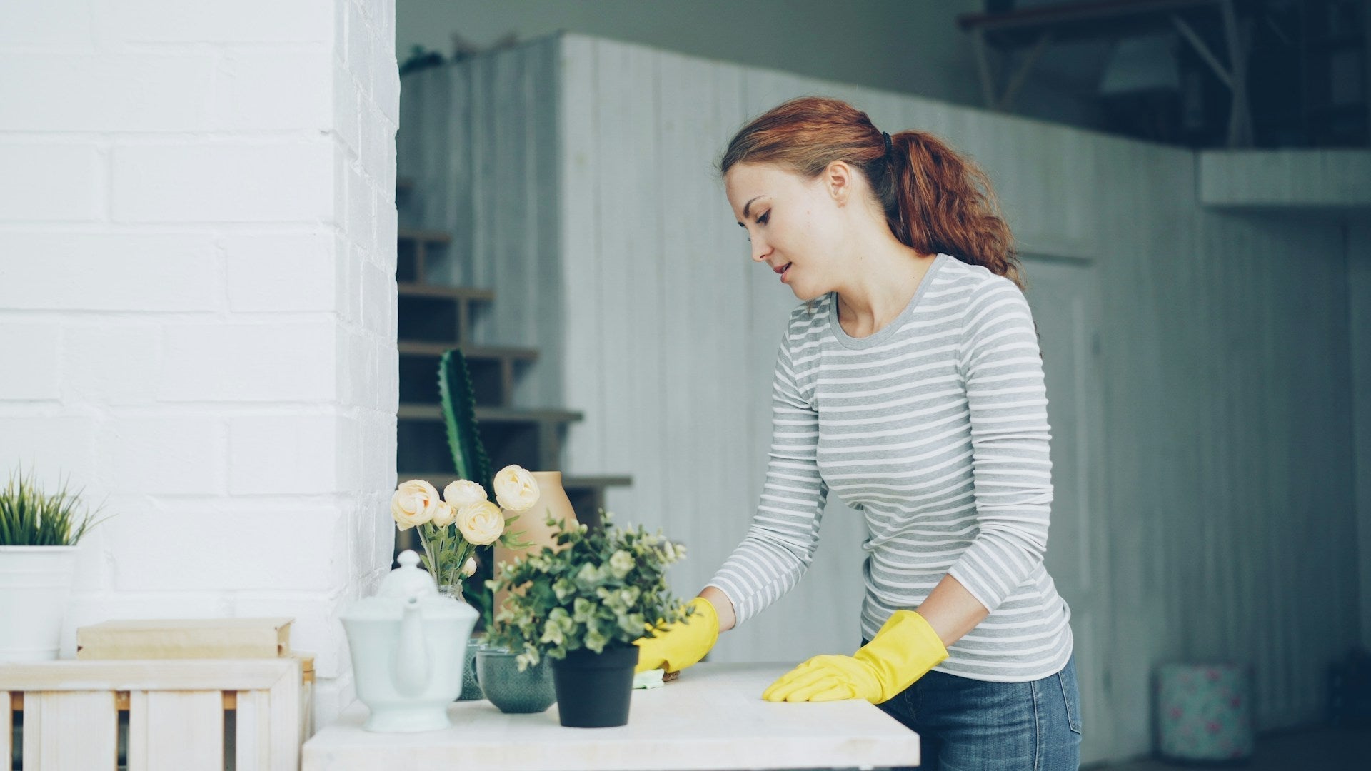 Person cleaning at home, making a sustainable cleaning schedule that actually sticks