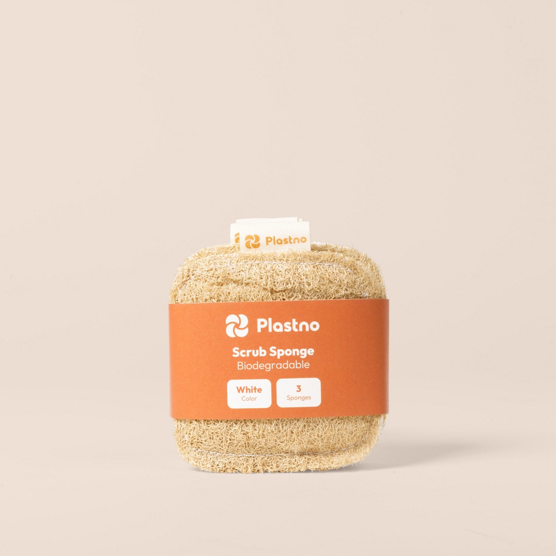 Plastno Scrub Sponge: loofah dish sponge 3-pack in tan and white with an orange paper band on a beige background