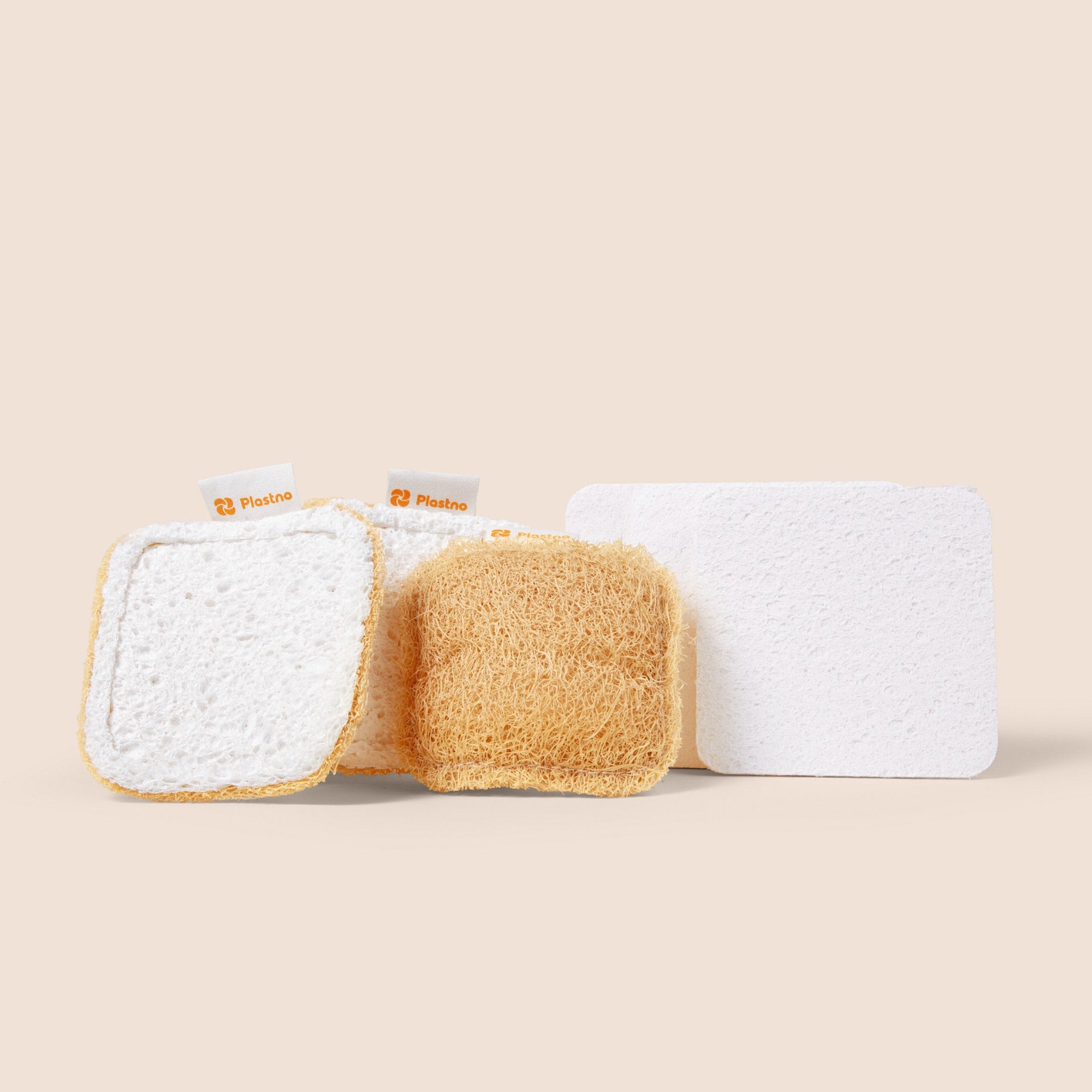 Plastno Kitchen Sponge Set: loofah Scrub Sponges beside a flat Soak Sponge before it expands