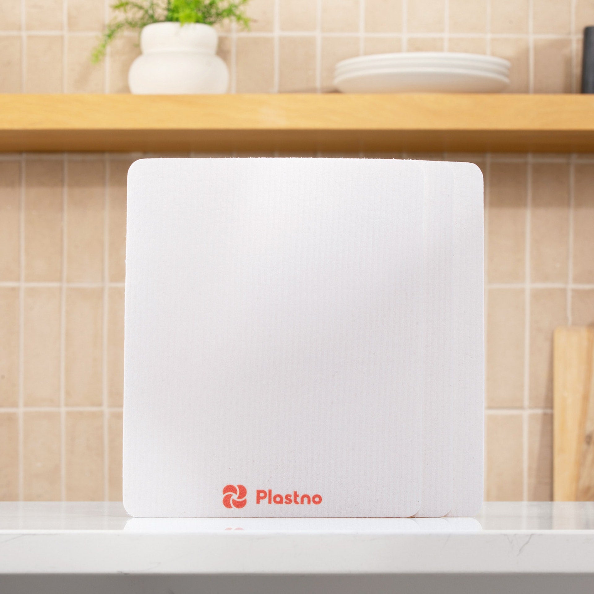 Plastno Sponge Towel sized 9.5 by 11.5 inches, larger reusable paper towel for full-counter wipes